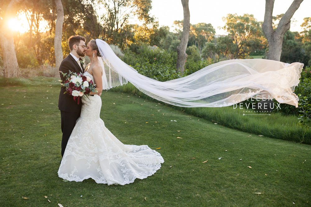 joondalup resort wedding luxx wedding events burgundy and gold wedding flowers long veil 