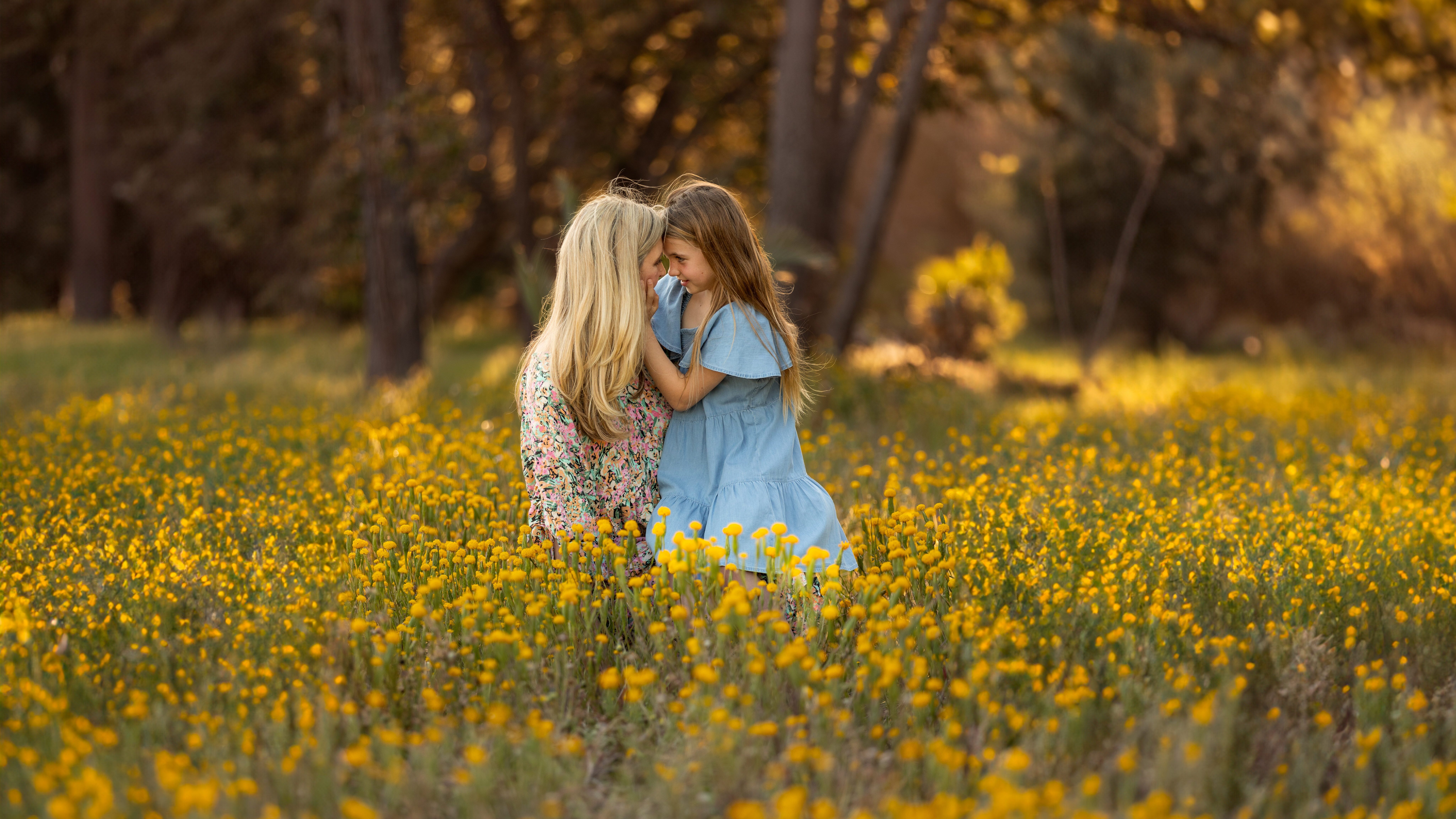mother and daughter sitting in a field of flowers
Why Professional Family Photos
perth family photographer
