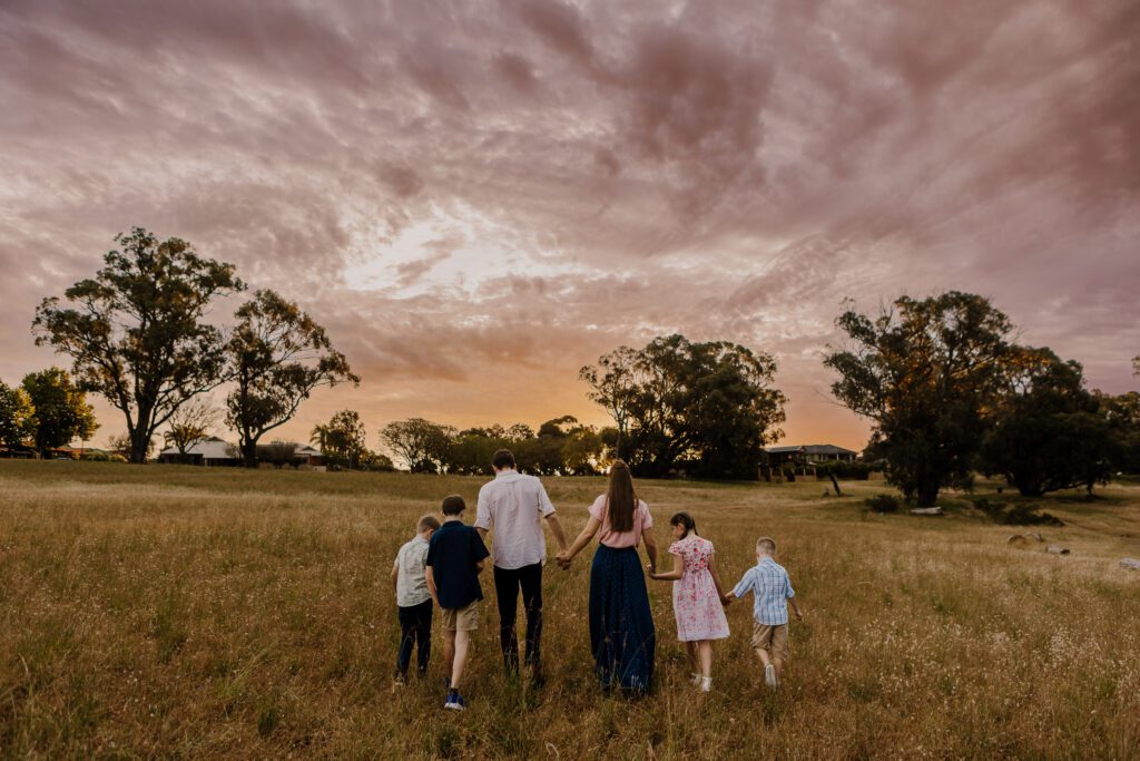 Soft golden light during a mini family photography session with young kids